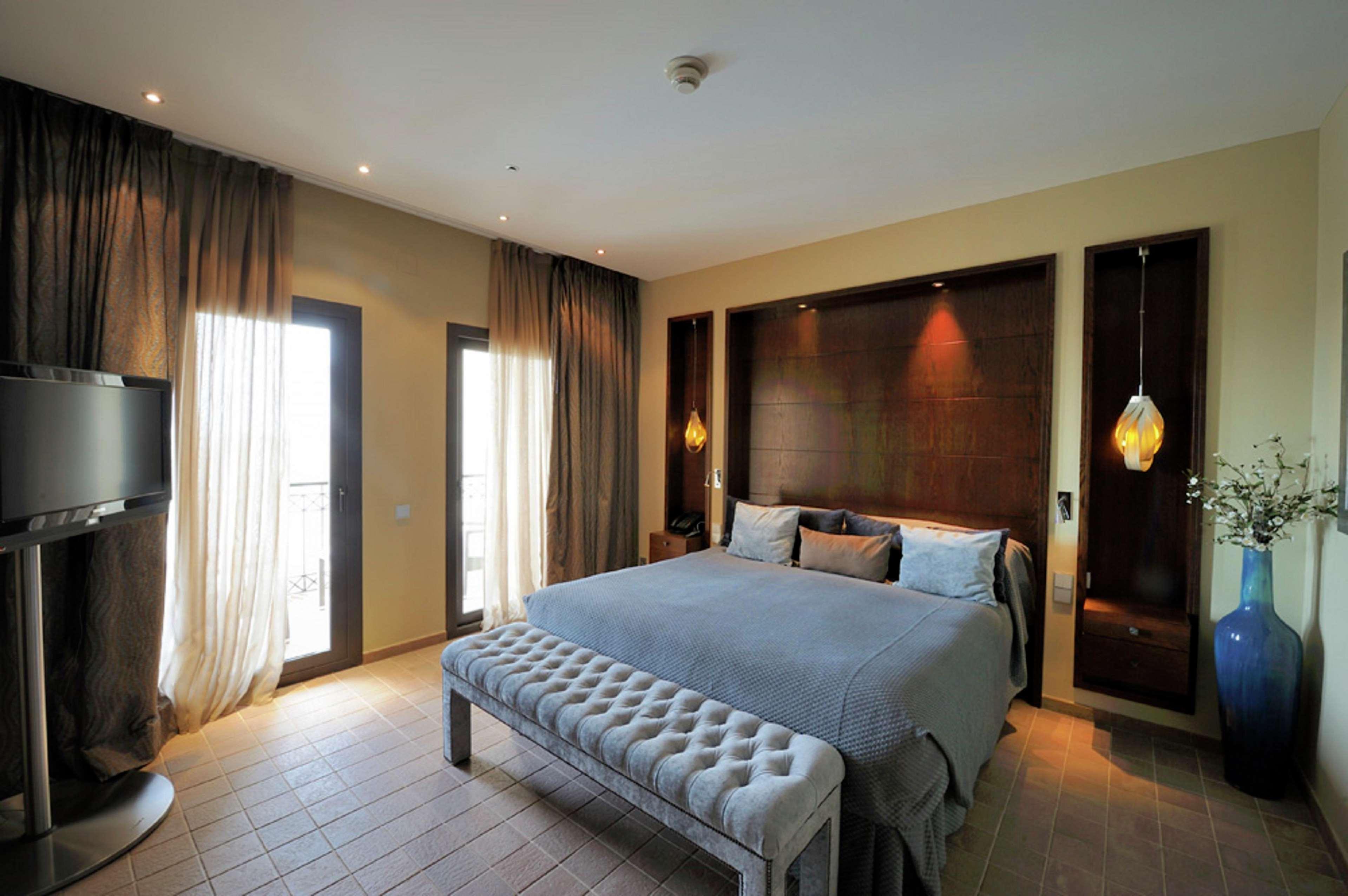 Doubletree By Hilton La Torre Golf Resort Roldán Εξωτερικό φωτογραφία A bedroom at the hotel