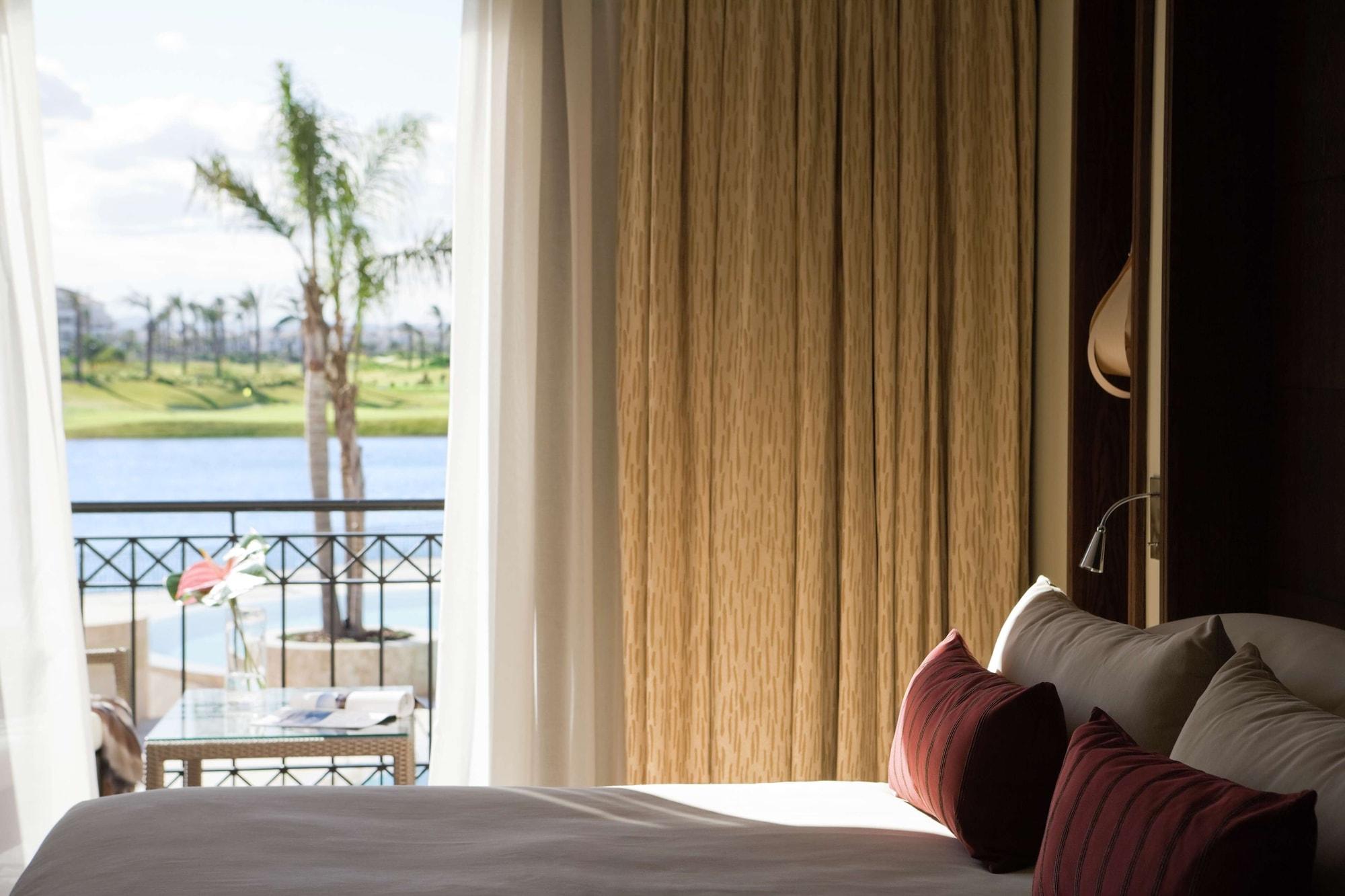 Doubletree By Hilton La Torre Golf Resort Roldán Εξωτερικό φωτογραφία A bedroom at the resort