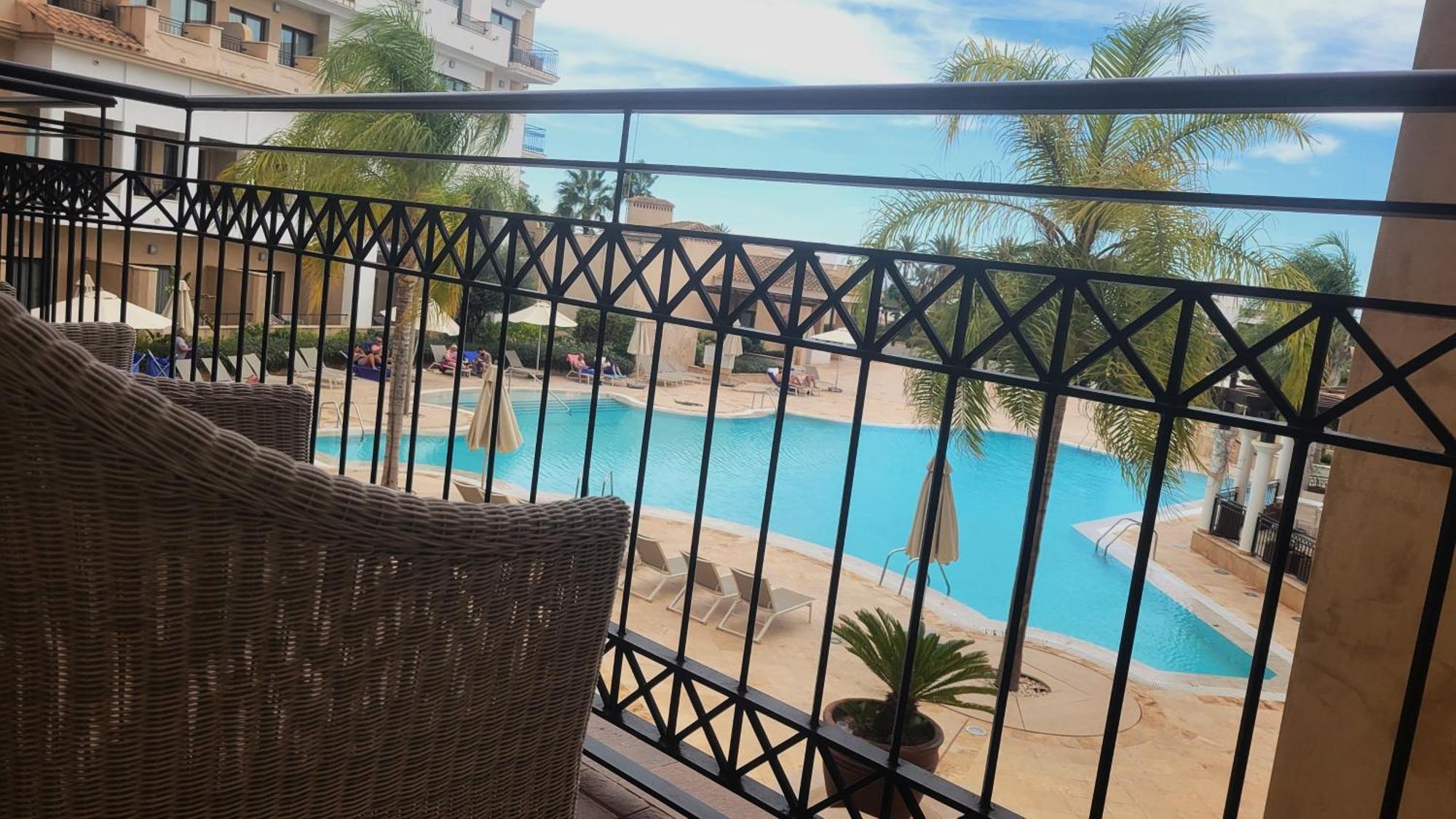 Doubletree By Hilton La Torre Golf Resort Roldán Εξωτερικό φωτογραφία View of the pool at the hotel